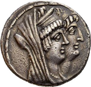 SELEUKID KINGS of SYRIA, Kleopatra Thea and Antiochos VIII. 125-121 BC. AR tetradrachm (16,61 g). Damaskos mint, dated S.E. 192 = 121/0 BC. Jugate heads right; Kleopatra Thea, veiled and wearing stephane and necklace; diademed head of Antiochos VIII / BASI?ISSHS / ?????????S / T??S : KAI BAS-I?EOS ANT-IO?OY, Zeus seated left on throne, holding Nike and resting on sceptre: monogram in outer left field and below throne. Bqp (date) in exergue. Very minor old contact marks in fields. Attractive deep iridescent cabinet toning.