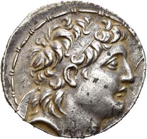SELEUKID KINGS of SYRIA. Antiochos VII Sidetes (138-129 BC). AR tetradrachm (16,47 g). Cappadocian imitations in the name of Antiochos VII, struck circa 130-80 BC. Diademed head of Antiochos VII to right / BASI?EOS ANTIOXOY EYEPGETOY, Athena standing left, holding Nike in right hand and grounded shield in left hand, spear behind; monogram above A in left field; O in inner left field; ? in inner right field. All within laurel wreath. Very minor roughness on the reverse. Toned.