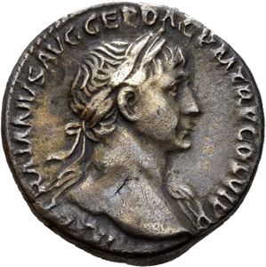 Trajan. AD 98-117. AR denarius, Roma AD 112-114, (3,41 g). Laureate head of Trajan right, slight drapery / DIVVS PATER TRAIAN, Trajan's father seated left on curule chair, holding patera and sceptre. Old scratches under tone. Deeply toned. Scarce issue.