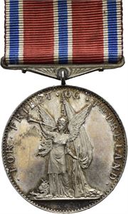 Landsskytterstyrets belønningsmedalje. Sølv med agraff og bånd. 31 mm