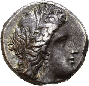 LUCANIA, Metapontion. 340-330 BC. AR didrachm (7,84 g). Wreathed head of Demeter to right, wreathed with grain / META, Grain ear with leaf to right, plow above leaf. Struck on a compact flan. Nice iridescent toning.