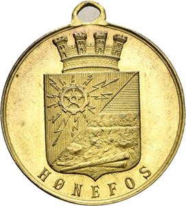 Hønefoss by 50 år 1852-1902. Forgylt bronse med hempe. 27 mm