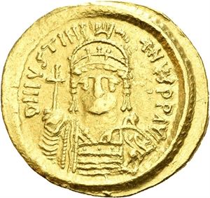 Justinian I 527-565, AV solidus, Constantinople (4,44 g). Helmeted and cuir. bust facing., holding globe with cross and shield/Angel stg. facing holding long linear staff and globe with cross