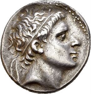 SELEUKID KINGS of SYRIA, Antiochos II Theos. 261-246 BC. AR tetradrachm (16,96 g). Ephesos (?) mint. Diademed head right / ??S???OS ANTIO-XOY, Apollo Delphios seated left on omphalos, holding bow and resting arm on ampholos; monogram in outer right field. A bit softly struck. Some roughness in upper field on the obverse. Light iridescent cabinet toning. Rare.