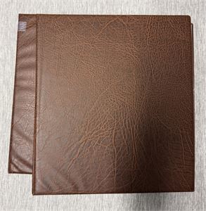 To myntalbum fyldig med 1-øre til 1 krone