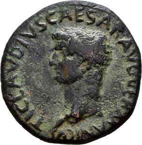 Roman provincial ACHAEA, Patrae. Claudius. AD 41-54. AE 27 mm, (10,09 g). Bare head of Claudius left / COL ·A·A· PATR / X - XII, Legionary eagle between two standards of the 10th and 12th legions. Scrape on reverse and minor scuff on obverse. Green patina with light and dark tones.