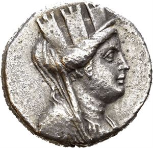 PHOENICIA, Arados. Dated year 196 (=64/63 BC). AR tetradrachm (14,77 g). Veiled and turreted bust of Tyche to right / APA?ION, Nike advancing left, holding aphlaston in her right hand and palm branch over her left shoulder; ?qP (date) above Aramaic H; ?S in lower left field. All within wreath. Minor pitting in the fields. Lightly toned.