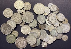 550 gram med utenlands sølvmynt fra bo