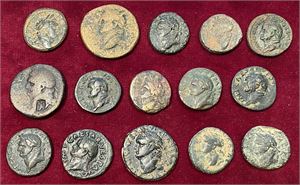 # 22. Lot of 15 Roman Provincial bronze coins from the Flavian dynasty struck in Rome for circulation in Syria.