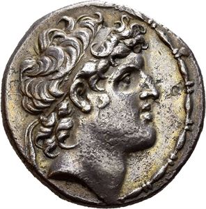 SELEUKID KINGS of SYRIA, Alexander I Balas. 152-145 BC. AR tetradrachm (16,29 g). Antioch on the Orontes mint. Dated S.E. 167 =146/5 BC. Diademed head of Alexander I to right / BASI?EOS A?E?AN?POY - TEO?ATOPOS EYEPGETOY, Zevs seated left on throne, holding sceptre and Nike that crowns him. Z?P (date) followed by monogram in exergue. Minor roughness in fields. Wonderful iridescent cabinet toning.