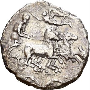 SICILY, Syracuse. 410-405 BC. AR hemidrachm (2,00 g). Engraved by Euarchidas or Euainetos? Struck under Second Democracy. Fast quadriga advancing right, driver crowned by Nike flying left, above; artist signature E in exergue (almost invisible) / SYPAKOSION, Head of Arethousa left, wearing sphendone; two dolphins around. Lightly toned; some roughness. Rare.