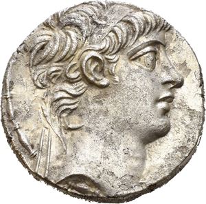 SELEUKID KINGS of SYRIA. Antiochos X Eusebes Philopator (94-88 BC). AR tetradrachm (15,87 g). Antioch on the Orontes mint, struck 94 BC (first reign). Diademed head of Antiochos X to right / BASI?EOS ANTIO?OY EYSEBOYS FI?O?ATOPOS, Zeus enthroned to left, holding Nike in right hand and resting on scepter with left hand; monogram above A in outer left field; monogram beneath throne. All within laurel wreath. Minor porosity on the obverse. Lightly toned.