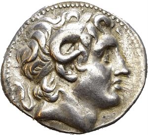 KINGS of THRACE, Macedonian. Lysimachos (305-281 BC). Smyrna mint. Struck ca. 287-282 BC. AR tetradrachm (16,70 g). Diademed head of Alexander the Great right, wearing horn of Ammon / ??S???OS ??S??????, Athena sitting on throne, holding Nike and resting arm on grounded shield; spear behind; inner left, turreted head of the Tyche of Smyrna to right; outer left, F. Traces of horn silver on the reverse. Lusterous surfaces with light golden hues. Scarce.