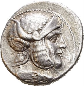 SELEUKID KINGS of SYRIA. Seleukos I Nikator (312-281 BC). AR tetradrachm (17,00 g). Struck in Susa circa 305-295 BC. Helmeted head of Alexander III or Seleukos? to right, helmet covered with panther skin and decorated with the ear and horns of a bull / &Beta;&Alpha;&Sigma;&Iota;&Lambda;&Epsilon;&Omega;&Sigma; &Sigma;&Epsilon;&Lambda;&Epsilon;&Upsilon;&Kappa;&Omicron;&Upsilon;, Nike standing right, crowning trophy, monogram to left and between Nike and Trophy. Obverse struck a little off centre and minor die wear. Lightly toned.