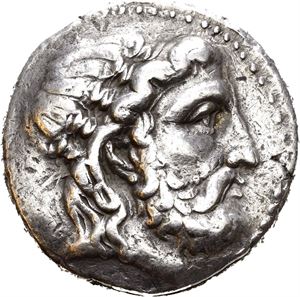 SELEUKID KINGS of SYRIA. Seleukos I Nikator (312-281 BC). AR tetradrachm (17,26 g). Seleukeia on the Tigris mint. Struck circa 296/5-281 BC. Laureate head of Zeus right / ??S???OS S???????, Athena advancing right in elephant quadriga, brandishing spear and shield, anchor above; TH(?) in exergue. Very light die shift on obverse. Light scratches and marks on the reverse. Lightly toned.