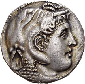 PTOLEMAIC KINGS of EGYPT. Ptolemy I Soter (as satrap, 323-305/4 BC or king 305/4-282 BC). AR tetradrachm (15.57 g). In the name of Alexander III of Macedon. Struck circa 311-305 BC in Alexandria. Diademed head of the deified Alexander to right, wearing elephant skin headdress / &Alpha;&Lambda;&Epsilon;&Xi;&Alpha;&Nu;&Delta;&Rho;&Omicron;&Upsilon;, Athena Alkidemos advancing right, brandishing spear and shield; &Theta;E monogram in inner left field; eagle standing on thunderbolt and Corinthian helmet in right field; &Delta;I in inner right field. Struck from dies of exeptional style. A few scratches and faint graffiti on the reverse. Minor die break on the obverse. Wonderful iridescent toning.