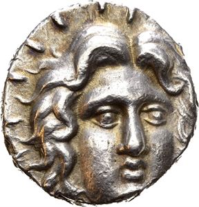 ISLANDS off CARIA, Rhodes. Circa 225-220 BC. AR tetradrachm (13,46 g). Tarsytas, magistrate. Head of Helios facing 3/4th to right, rays around head / TAPSYTAS (magistrate), Rose with one bud to right, eagle standing on thunderbolt to left; P-O below rose. Obverse struck a litte off centre. Lovely toning with light golden highlights around devices.